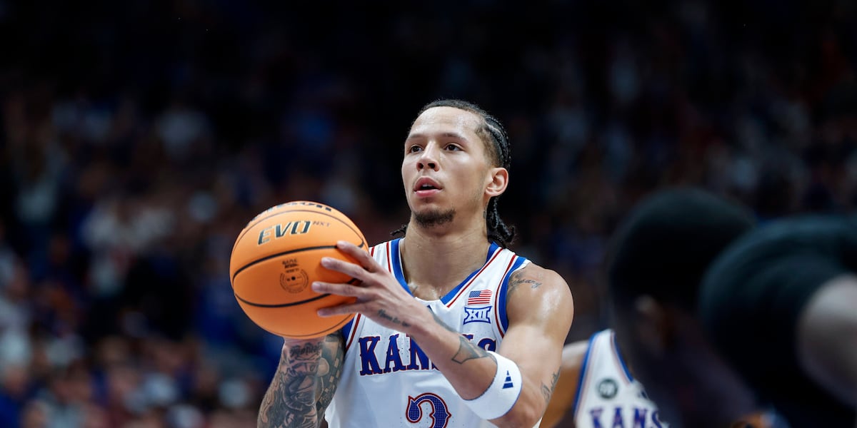 KU's Tre White signs with Miami Heat