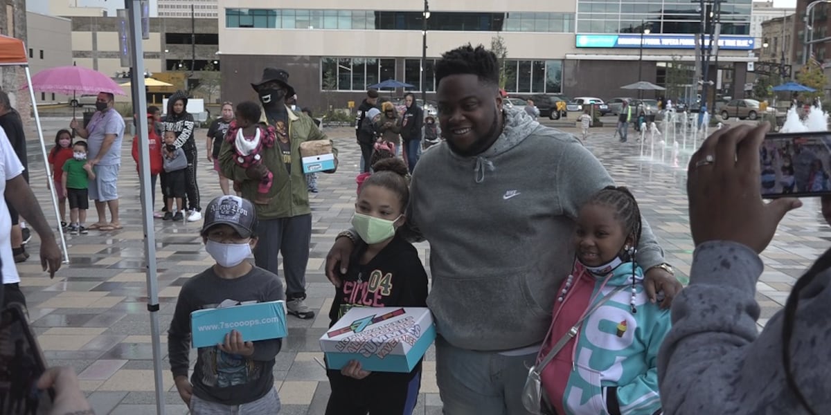 Rapper T-Rell gives away 300 pairs of shoes to children
