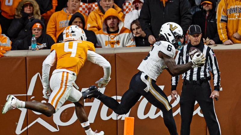 Vanderbilt wide receiver Tre Richardson (6) catches a pass for a touchdown in front of...