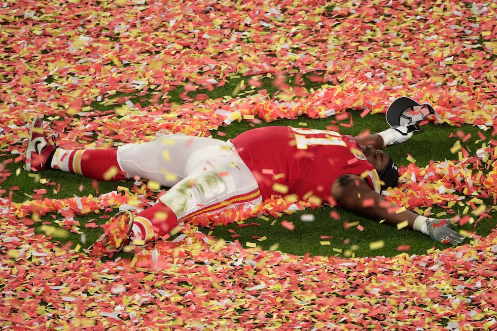 Kansas City Chiefs' Derrick Nnadi (91) plays with the confetti, at the end of the NFL Super...