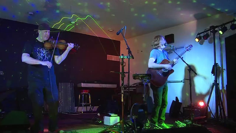 Nate in the Evening performs at Artismo Gallery and Bistro during the first "First Friday...