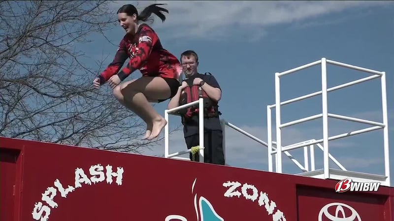 Special Events Coordinator, Katelyn Andrist, jumps into the cold plunge.